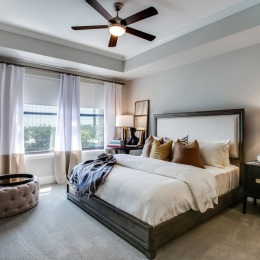 Bedroom with natural lighting and high ceilings