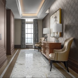 a spacious nook with seating and natural light