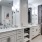 Spacious bathroom features plenty of counterspace, storage and a walk-in shower with tub